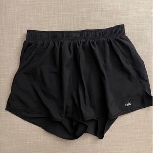 ALO Yoga Stride Running Shorts in Black, Size M